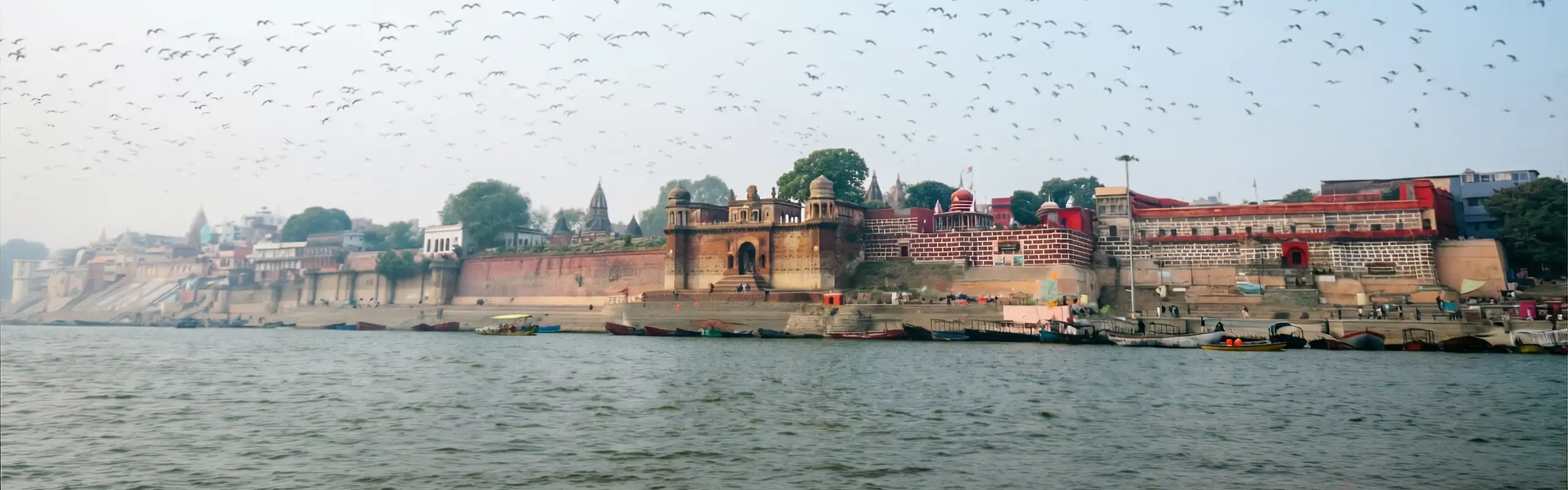 Pre-wedding shoot in Varanasi - couple portrait at Assi Ghat by The WeddingShoot